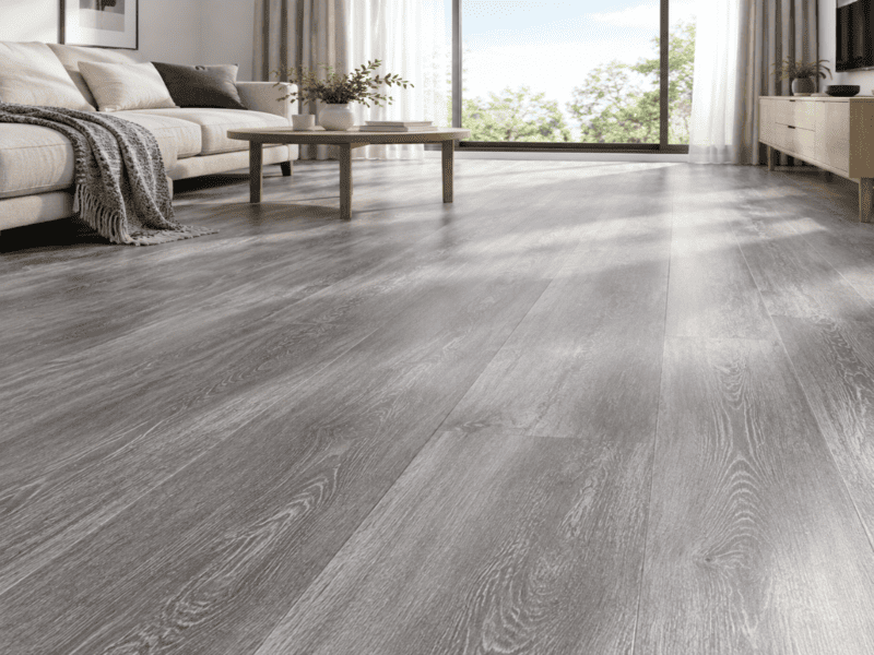 sunlight on vinyl plank floor near sliding glass doors